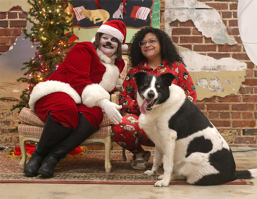 Kayle Jackson, a resident of Cleveland and Rescue Coordinator at Blount County’s shelter, brought her own rescued pup, Lady, for a visit with Santa Paws. Photo by Kristin Yarbrough.