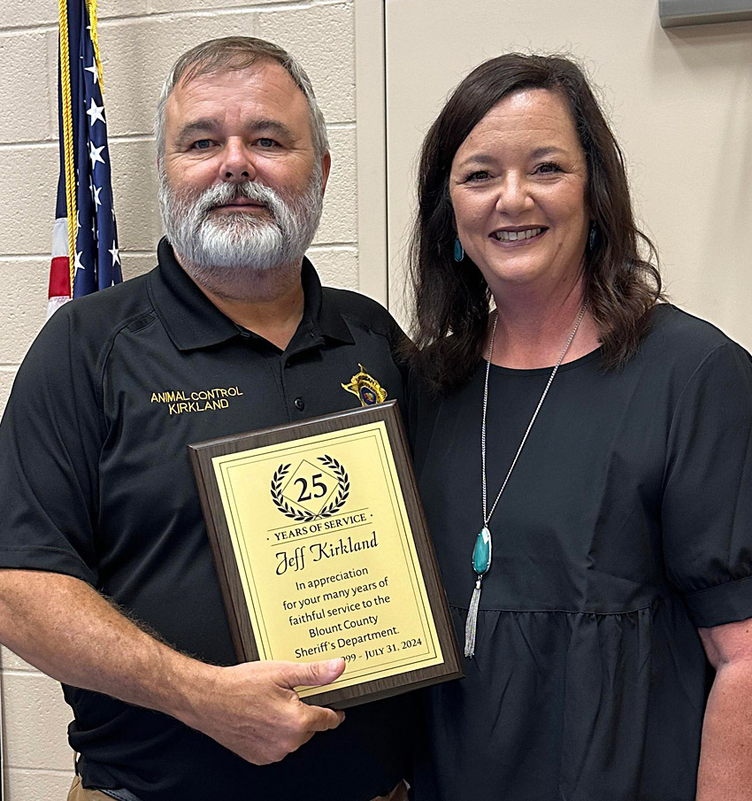 Jeff Kirland, pictured with his wife Teresa, is honored for 25 years of faithful service to the Blount County Sheriff's Department. Photo courtesy of Jeff Kirkland.