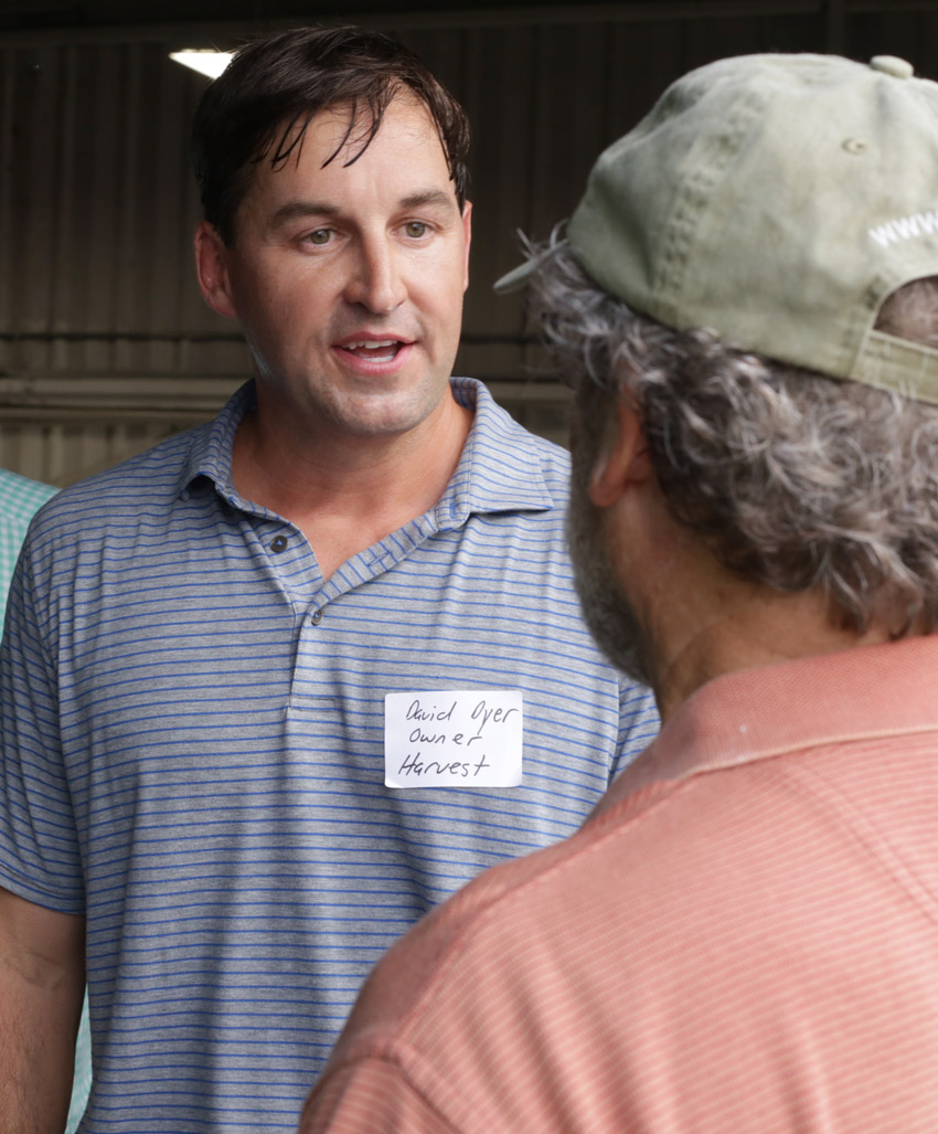 David Dyer, CEO of Harvest Med Waste Disposal, speaks with Sam Howell of Friends of the Locust Fork River at an Aug. 22 community awareness session. Photo by Kristin Yarbrough.